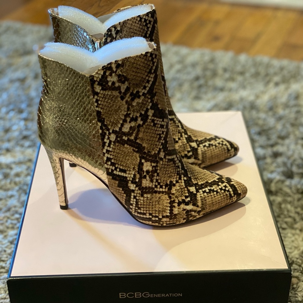 NWT BCBGeneration high heel boots in snake print.